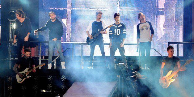 British Group One Direction perform in concert in Santiago, on April 30, 2014. AFP PHOTO/ FRANCESCO DEGASPERI (Photo credit should read FRANCESCO DEGASPERI/AFP/Getty Images)