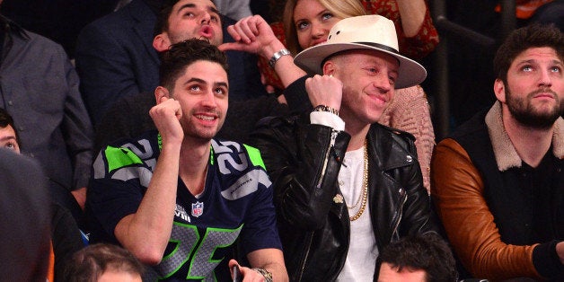 NEW YORK, NY - FEBRUARY 01: Ryan Lewis and Macklemore attend the Miami Heat vs New York Knicks game at Madison Square Garden