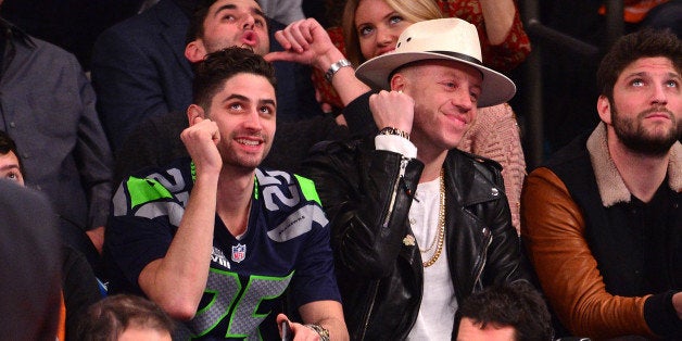 NEW YORK, NY - FEBRUARY 01: Ryan Lewis and Macklemore attend the Miami Heat vs New York Knicks game at Madison Square Garden on February 1, 2014 in New York City. (Photo by James Devaney/GC Images,)