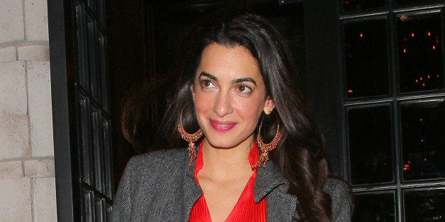 LONDON, UNITED KINGDOM - OCTOBER 24: Amal Alamuddin leaving Berners Tavern restaurant on October 24, 2013 in London, England. (Photo by Mark Robert Milan/FilmMagic)