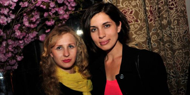 Maria Alyokhina, left, and Nadezhda Tolokonnikova, members of Pussy Riot, attend the Bloomberg Vanity Fair White House Correspondents' Association (WHCA) dinner afterparty in Washington, D.C., U.S., on Saturday, May 3, 2014. The WHCA, celebrating its 100th anniversary, raises money for scholarships and honors the recipients of the organization's journalism awards. Photographer: Pete Marovich/Bloomberg via Getty Images 