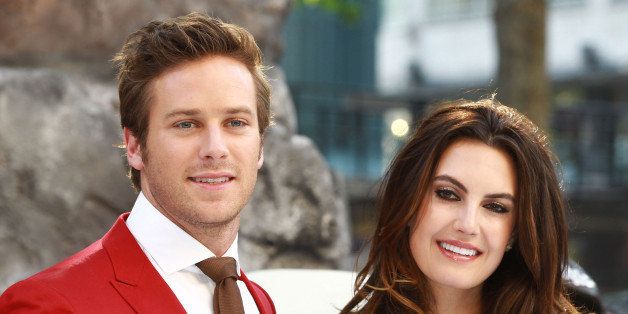 LONDON, UNITED KINGDOM - JULY 21: Armie Hammer and Elizabeth Chambers attends the premiere of 'The Lone Ranger' at Odeon Leicester Square on July 21, 2013 in London, England. (Photo by Fred Duval/FilmMagic)