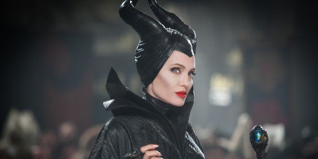 This July 17 2012, photo, released by Disney shows Angelina Jolie in a scene from "Maleficent." Spanish accesory designer Manuel Albarran created the collars and jewelry that Angelina Jolie wears on the movie âMaleficentâ, which opens in Mexico and USA on May 30. Albarran, known as a metal couturier, worked closely with Jolie to achieve a look in between wild, femenine, shining and dark using materials like fur, leather and metal. (AP Photo/Disney, Frank Connor)