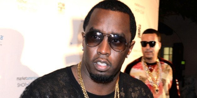 MIAMI BEACH, FL - FEBRUARY 08: Sean P. Diddy Combs attends Team Fat Joe Celebrates Market America on February 8, 2014 in Miam