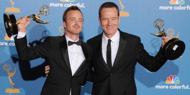 LOS ANGELES, CA - AUGUST 29: Bryan Cranston (L) and Aaron Paul pose in the press room with their awards for 'Outstanding Lead