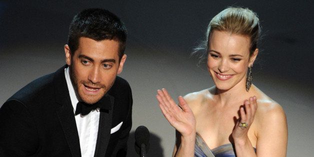 Actor Jake Gyllenhaal and Rachel Mcadams present the award for Best Adapted Screenplay at the 82nd Academy Awards at the Kodak Theater in Hollywood, California on March 07, 2010. AFP PHOTO Gabriel BOUYS (Photo credit should read GABRIEL BOUYS/AFP/Getty Images)