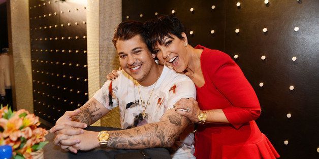LAS VEGAS, NV - MARCH 16: Rob Kardashian and Kris Jenner during Rob Kardashian's Arthur George Street sock line launch at Kardashian Khaos at The Mirage Hotel & Casino on March 16, 2013 in Las Vegas, Nevada. (Photo by Denise Truscello/WireImage)