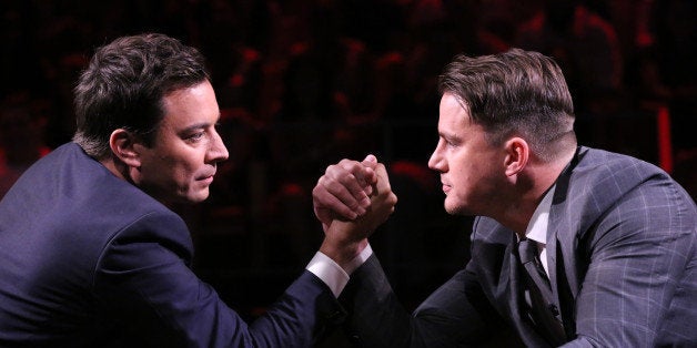 THE TONIGHT SHOW STARRING JIMMY FALLON -- Episode 0070 -- Pictured: (l-r) Jimmy Fallon and Channing Tatum arm wrestle on June 6, 2014 -- (Photo by: Douglas Gorenstein/NBC/NBCU Photo Bank via Getty Images)