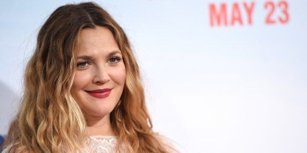 Actress Drew Barrymore arrives for the red carpet premiere of 'Blended,' May 21, 2014 at TCL Chinese Theatre in Hollywood, California. AFP PHOTO / ROBYN BECK (Photo credit should read ROBYN BECK/AFP/Getty Images)