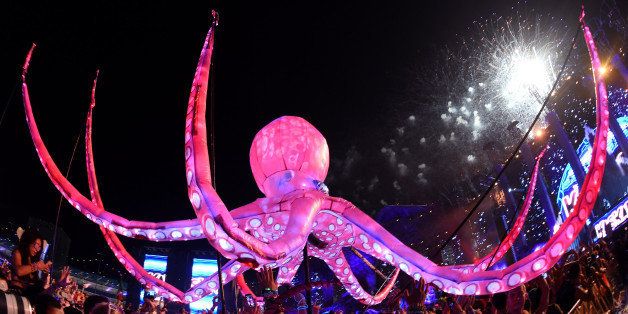 LAS VEGAS, NV - JUNE 22: Performers carry an octopus puppet through the crowd during a set by Kaskade at the 18th annual Electric Daisy Carnival at Las Vegas Motor Speedway on June 22, 2014 in Las Vegas, Nevada. (Photo by Ethan Miller/Getty Images)