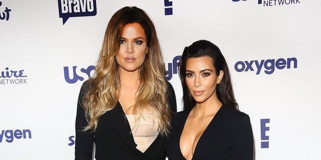 NEW YORK, NY - MAY 15: (L-R) Khloe Kardashian and Kim Kardashian attend the 2014 NBCUniversal Cable Entertainment Upfronts at The Jacob K. Javits Convention Center on May 15, 2014 in New York City. (Photo by Astrid Stawiarz/Getty Images)