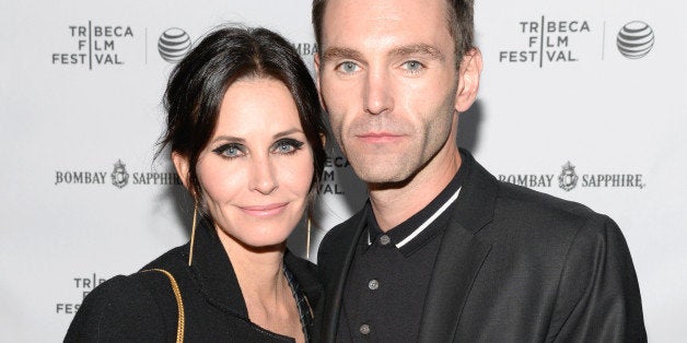 NEW YORK, NY - APRIL 24: Director Courteney Cox (L) and Musician Johnny McDaid attend the official after party for Courteney Cox's directorial debut 'Just Before I Go' hosted by BOMBAY SAPPHIRE Gin at The Flatiron Room on April 24, 2014 in New York City. (Photo by Dave Kotinsky/Getty Images for Bombay Sapphire)