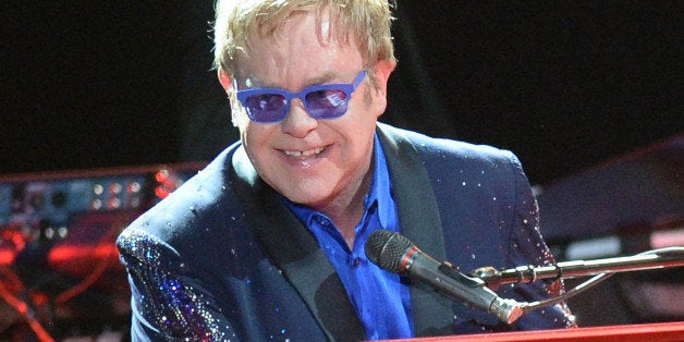 MANCHESTER, TN - JUNE 15: Artist Sir Elton John performs during the 2014 Bonnaroo Music & Arts Festival on June 15, 2014 in Manchester, Tennessee. (Photo by Jason Merritt/Getty Images)