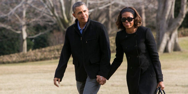 WASHINGTON, DC - MARCH 9: U.S. President Barack Obama (L) and the first lady Michelle Obama return to the White House on Mar