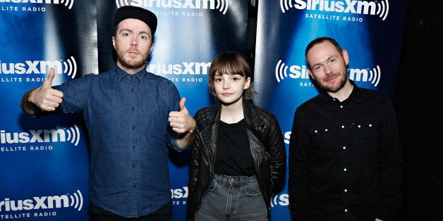 NEW YORK, NY - DECEMBER 10: Martin Doherty, Lauren Mayberry and Iain Cook of CHVRCHES attend the private CHVRCHES Concert at The McKittrick Hotel; Concert To Air On SiriusXM's SiriusXMU Channel on December 10, 2013 in New York City. (Photo by Cindy Ord/Getty Images for SiriusXM)