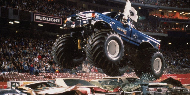 ANAHEIM - 1989: Bigfoot flies over cars during the monster truck rally at Anaheim Stadium in 1989 in Anaheim, California. Photo by: Tim Defrisco/Getty Images