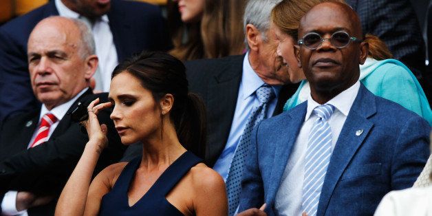 LONDON, ENGLAND - JULY 06: Victoria Beckham and Samuel L Jackson in the Royal Box on Centre Court before the Gentlemen's Singles Final match between Roger Federer of Switzerland and Novak Djokovic of Serbia on day thirteen of the Wimbledon Lawn Tennis Championships at the All England Lawn Tennis and Croquet Club on July 6, 2014 in London, England. (Photo by Pool/Getty Images)