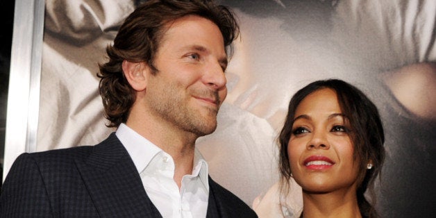 LOS ANGELES, CA - SEPTEMBER 04: Actors Bradley Cooper (L) and Zoe Saldana arrive at the premiere of CBS Films' 'The Words' a