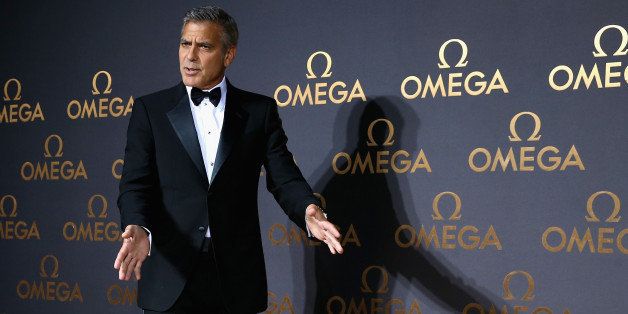 SHANGHAI, CHINA - MAY 16: Actor George Clooney arrives for the red carpet of Omega Le Jardin Secret dinner party on May 16, 2014 in Shanghai, China. (Photo by Feng Li/Getty Images)