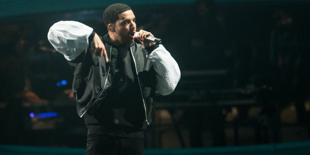 LONDON, ENGLAND - MARCH 24: Drake performs at O2 Arena on March 24, 2014 in London, England. (Photo by Ian Gavan/Getty Imag