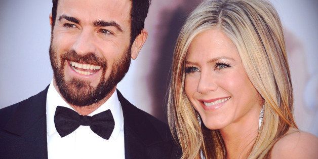 HOLLYWOOD, CA - FEBRUARY 24: (EDITORS NOTE: Image has been digitally manipulated) Writer Justin Theroux (L) and actress Jennifer Aniston arrive at the 85th Annual Academy Awards at Hollywood & Highland Center on February 24, 2013 in Hollywood, California. (Photo by Jason Merritt/Getty Images)
