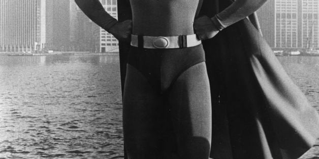 24-year-old American film actor Christopher Reeve stands before the Manhattan skyline dressed as the comic-book hero of the f