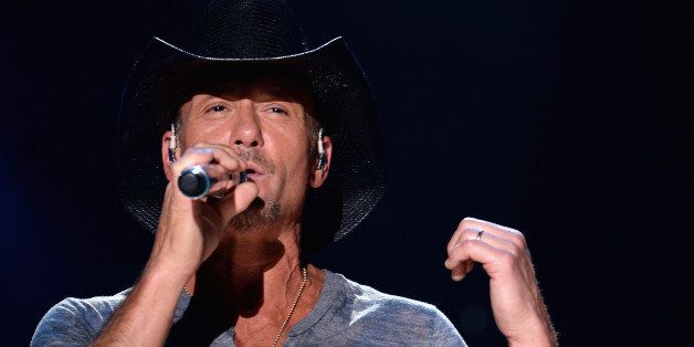 NASHVILLE, TN - JUNE 05: Tim McGraw performs onstage at the 2014 CMA Festival on June 5, 2014 in Nashville, Tennessee. (Photo by Larry Busacca/Getty Images)