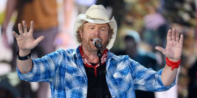 LAS VEGAS, NV - APRIL 07: Recording artist Toby Keith performs during ACM Presents: An All-Star Salute To The Troops at the MGM Grand Garden Arena on April 7, 2014 in Las Vegas, Nevada. (Photo by Ethan Miller/Getty Images for ACM)
