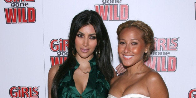 WEST HOLLYWOOD, CA - APRIL 22: TV personality Kim Kardashian and Adrienne Bailon, actor arrives at the Girls Gone Wild Magazine Launch party held at Area Nightclub on April 22, 2008 in West Hollywood, California. (Photo by Frazer Harrison/Getty Images)