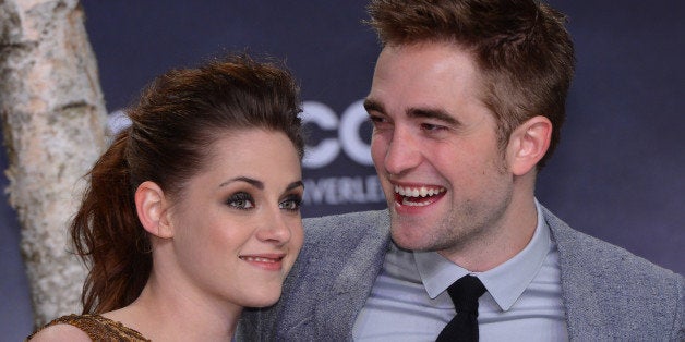 US actress Kristen Stewart (L) and British actor Robert Pattinson pose prior the premier of 'The Twilight Saga: Breaking Dawn - Part 2' film premier in Berlin on November 16, 2012. AFP PHOTO / BRITTA PEDERSEN /GERMANY OUT (Photo credit should read BRITTA PEDERSEN/AFP/Getty Images)