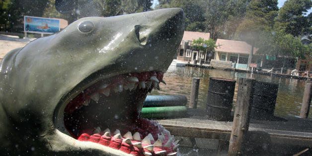 Hollywood, UNITED STATES: The set of the Steven Spielberg film 'Jaws' is pictured at Universal Studios in Hollywood, 09 April 2007. Universal Studios Hollywood is the original Universal Studios theme park, created initially to offer tours of the real Universal Studios soundstages and sets. It is one of four fully-fledged Universal Studios Theme Parks, along with Universal Studios Orlando, Universal Studios Japan, and the upcoming Universal Studios Singapore, which will be completed by 2010. From the beginning, Universal has offered tours of its studio. In the silent-film days, Carl Laemmle's tour included a chance to buy fresh produce, since then-rural Universal City was still in part a working farm. Shortly after MCA took over Universal Pictures in 1962, accountants suggested a tour stop in the studio commissary would increase profits, and in 1964, the modest tour was expanded to include a series of dressing room walk-throughs, peeks at actual production, and later, staged events. This grew over the years into a full-blown theme park - the narrated tram (formerly 'Glamortram') tour still runs through the studio's active backlot, but the staged events, stunt demonstrations and high-tech rides overshadow the motion-picture production that once lured fans in Universal Studios Hollywood. AFP PHOTO/GABRIEL BOUYS (Photo credit should read GABRIEL BOUYS/AFP/Getty Images)