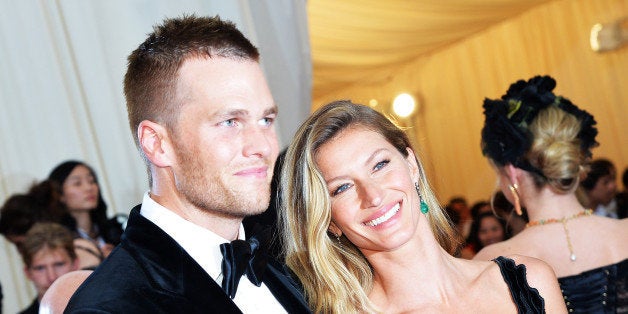 NEW YORK, NY - MAY 05: Tom Brady (L) and Gisele Bundchen attend the 'Charles James: Beyond Fashion' Costume Institute Gala a