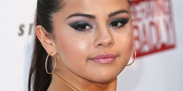 HOLLYWOOD, CA - JULY 29: Actress Selena Gomez attends the Premiere of 'Behaving Badly' at the ArcLight Hollywood on July 29, 2014 in Hollywood, California. (Photo by Frederick M. Brown/Getty Images)