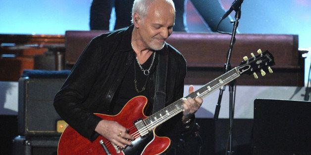 LOS ANGELES, CA - JANUARY 27: Musician Peter Frampton performs onstage during 'The Night That Changed America: A GRAMMY Salute To The Beatles' at the Los Angeles Convention Center on January 27, 2014 in Los Angeles, California. (Photo by Kevin Winter/Getty Images)