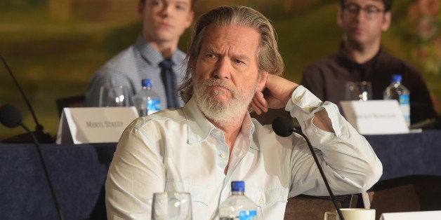 NEW YORK, NY - AUGUST 12: (L-R) Actors Cameron Monaghan and Jeff Bridges, and co-screenwriter Michael Mitnick take part in a press conference for the Weinstein Company's 'The Giver'at JW Marriott Essex House on August 12, 2014 in New York City. (Photo by Michael Loccisano/Getty Images for The Weinstein Company)