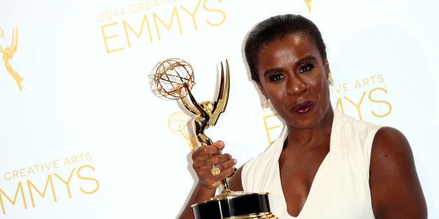 LOS ANGELES, CA - AUGUST 16: Actress Uzo Aduba attends the 2014 Creative Arts Emmy Awards press room held at the Nokia Theatre L.A. Live on August 16, 2014 in Los Angeles, California. (Photo by Tommaso Boddi/WireImage)