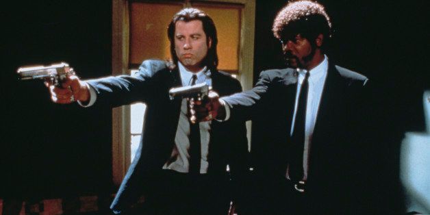 American actors John Travolta (left) as Vincent Vega and Samuel L Jackson as Jules Winnfield in a scene from 'Pulp Fiction', directed by Quentin Tarantino, 1994. (Photo by Miramax Films/Getty Images) 