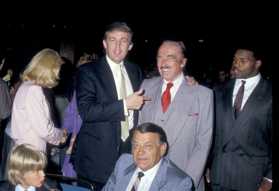 In this undated photo, Donald Trump (left) poses with his father, Fred Trump. According to a bombshell New York Times report,