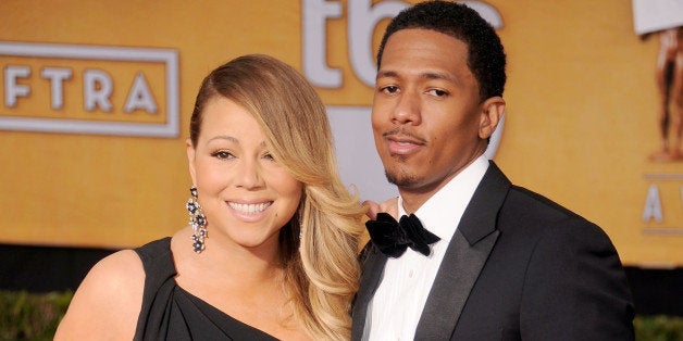 LOS ANGELES, CA - JANUARY 18: Singer Mariah Carey and actor/TV personality Nick Cannon arrive at the 20th Annual Screen Actors Guild Awards at The Shrine Auditorium on January 18, 2014 in Los Angeles, California. (Photo by Gregg DeGuire/WireImage)