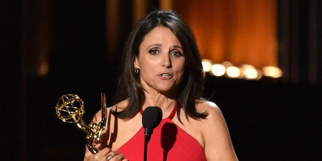 LOS ANGELES, CA - AUGUST 25: Actress Julia Louis-Dreyfus accepts Outstanding Lead Actress in a Comedy Series for 'Veep' onstage at the 66th Annual Primetime Emmy Awards held at Nokia Theatre L.A. Live on August 25, 2014 in Los Angeles, California. (Photo by Kevin Winter/Getty Images)