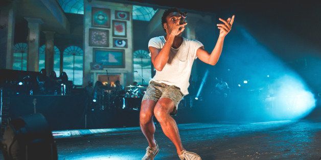 LONDON, UNITED KINGDOM - AUGUST 19: Childish Gambino performs on stage at Brixton Academy on August 19, 2014 in London, United Kingdom. (Photo by Joseph Okpako/Redferns via Getty Images)