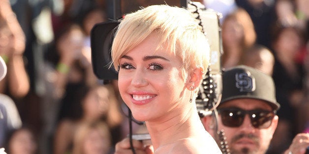 INGLEWOOD, CA - AUGUST 24: Singer Miley Cyrus attends the 2014 MTV Video Music Awards at The Forum on August 24, 2014 in Inglewood, California. (Photo by Jason Merritt/Getty Images for MTV)