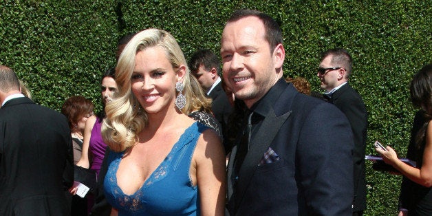 LOS ANGELES, CA - AUGUST 16: Actors Jenny McCarthy (L) and Donnie Wahlberg attend the 2014 Creative Arts Emmy Awards held at the Nokia Theatre L.A. Live on August 16, 2014 in Los Angeles, California. (Photo by Tommaso Boddi/WireImage)