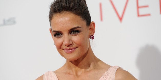 Katie Holmes attends the world premiere of "The Giver" at the Ziegfeld Theatre on Monday, Aug. 11, 2014, in New York. (Photo by Evan Agostini/Invision/AP)