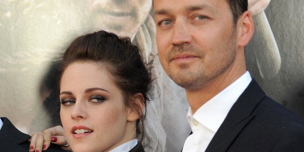 FILE - This May 29, 2012 file photo shows actress Kristen Stewart and director Rupert Sanders attending the "Snow White and the Huntsman" screening in Los Angeles. Stewart and director Rupert Sanders apologized publicly to their loved ones following reports of infidelity. The 22-year-old actress and the 41-year-old filmmaker issued separate apologies to People magazine Wednesday, July 25, saying they regret the hurt they have caused. Stewart has been in a relationship for several years with her âTwilightâ co-star Robert Pattinson. Sanders is married and has two children. (Photo by Jordan Strauss/Invision/AP)