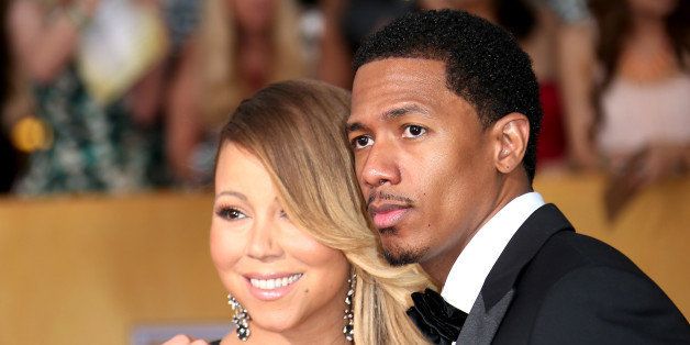LOS ANGELES, CA - JANUARY 18: Mariah Carey and Nick Cannon (R) arrive at the 20th Annual Screen Actors Guild Awards at the Shrine Auditorium on January 18, 2014 in Los Angeles, California. (Photo by Dan MacMedan/WireImage)