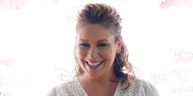 PASADENA, CA - AUGUST 16: Actress Alyssa Milano arrives at Disney Junior's 'Pirate And Princess: Power Of Doing Good' Tour Arrives In Los Angeles At Brookside Park at Brookside Park on August 16, 2014 in Pasadena, California. (Photo by Lilly Lawrence/Getty Images)