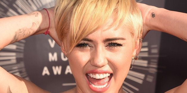 INGLEWOOD, CA - AUGUST 24: Singer Miley Cyrus attends the 2014 MTV Video Music Awards at The Forum on August 24, 2014 in Inglewood, California. (Photo by Jason Merritt/Getty Images for MTV)