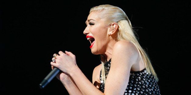 UNIVERSAL CITY, CA - DECEMBER 09: Singer Gwen Stefani of No Doubt performs onstage at the 23rd Annual KROQ Almost Acoustic Christmas at Gibson Amphitheatre on December 9, 2012 in Universal City, California. (Photo by Imeh Akpanudosen/Getty Images)