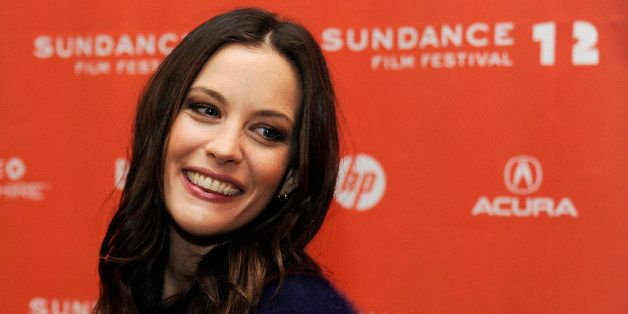Liv Tyler, a cast member in "Robot an Frank," looks back for photographers at the premiere of the film at the Sundance Film Festival in Park City, Utah, Saturday, Jan. 21, 2012. (AP Photo/Chris Pizzello)